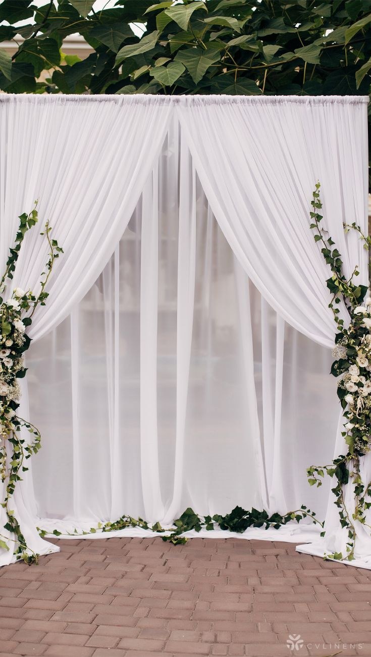 White draped backdrop